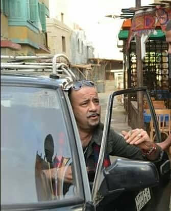 صورة محمد سعد وهو سائق تاكسي من فيلم “محمد حسين”